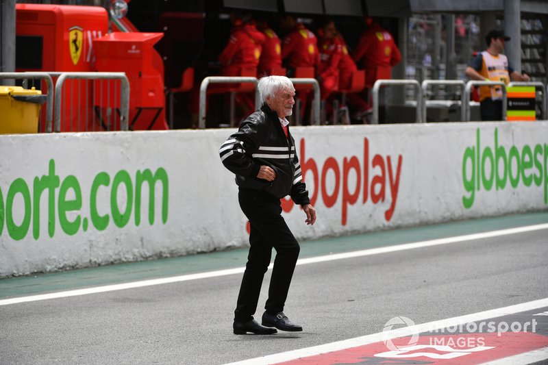 Bernie Ecclestone, Chairman Emiritus of Formula 1, crosses the pit lane