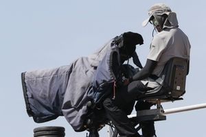  A camera man films the first MotoGP Practice 