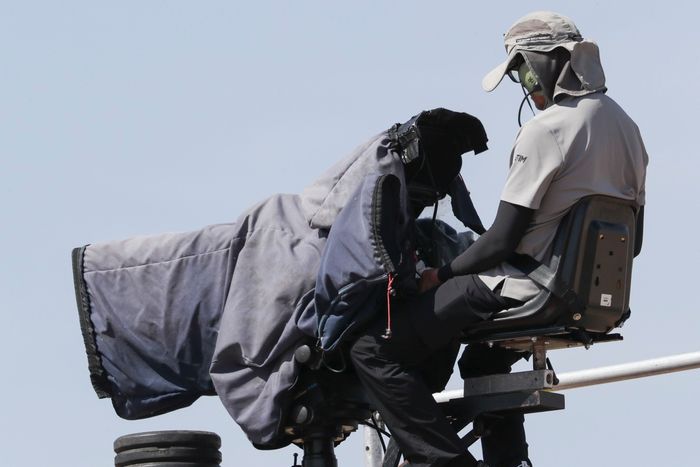  A camera man films the first MotoGP Practice 