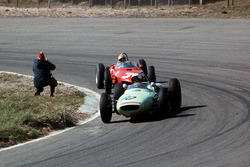 Masten Gregory, Lotus 18 Climax, leads Ricardo Rodriguez, Ferrari Dino 156