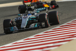 Valtteri Bottas, Mercedes AMG F1 W08, leads Max Verstappen, Red Bull Racing RB13
