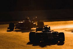 Marcus Ericsson, Sauber C36, leads Sebastian Vettel, Ferrari SF70H