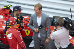 Reigning World Champion interviews Race winner Sebastian Vettel, Ferrari, Daniel Ricciardo, Red Bull Racing, after the podium
