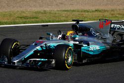 Lewis Hamilton, Mercedes AMG F1 W08, celebrates from his car as he returns to the pits