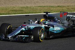 Lewis Hamilton, Mercedes AMG F1 W08, celebrates from his car as he returns to the pits