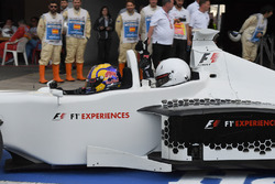 Patrick Friesacher, F1 Experiences 2-Seater driver and F1 Experiences 2-Seater passenger Belinda Whiteside