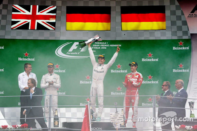 The podium (L to R): Lewis Hamilton, Mercedes AMG F1, second; Nico Rosberg, Mercedes AMG F1, race winner; Sebastian Vettel, Ferrari, third