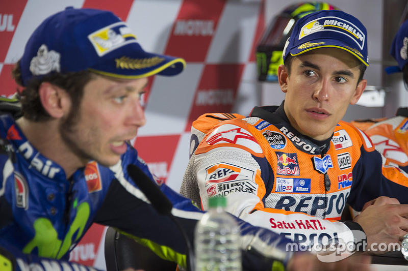 Second place Valentino Rossi, Yamaha Factory Racing, winner Marc Marquez, Repsol Honda Team