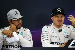 (L to R): Lewis Hamilton, Mercedes AMG F1 and team mate Nico Rosberg, Mercedes AMG F1 in the post qualifying FIA Press Conference
