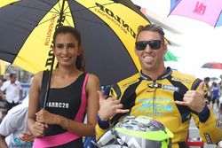 Anthony West with a hot grid girl