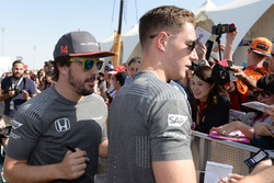 Fernando Alonso, McLaren and Stoffel Vandoorne, McLaren sign autographs for the fans