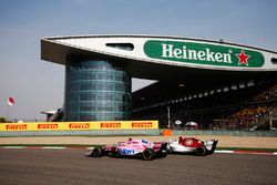 Sergio Perez, Force India VJM11 Mercedes, leads Charles Leclerc, Sauber C37 Ferrari