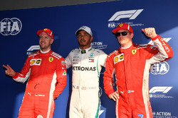 Third place Sebastian Vettel, Ferrari, pole sitter Lewis Hamilton, Mercedes-AMG F1 and second place