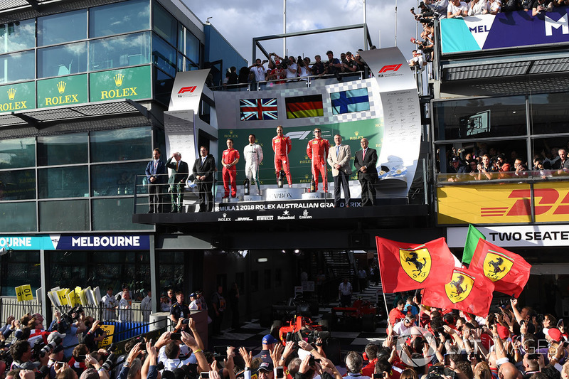 Lewis Hamilton, Mercedes-AMG F1, Sebastian Vettel, Ferrari and Kimi Raikkonen, Ferrari on the podium