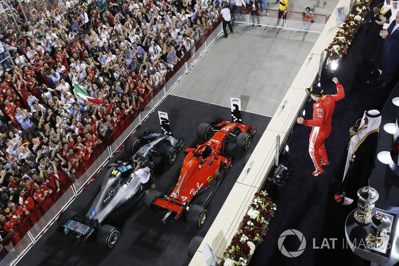 Sebastian Vettel, Ferrari, 1st position, celebrates victory on the podium