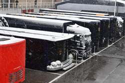 FIA trucks in the Paddock as snow stops testing