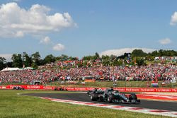 Lewis Hamilton, Mercedes AMG F1 W09 leads the pack on the first lap