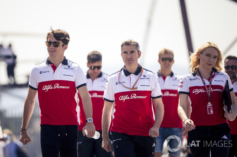 Charles Leclerc, Sauber walks the track with xevo and Ruth Buscombe, Sauber Race Strategist