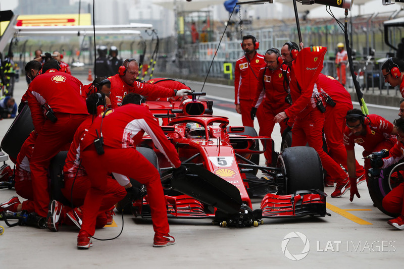 Sebastian Vettel, Ferrari SF71H, makes a pit stop