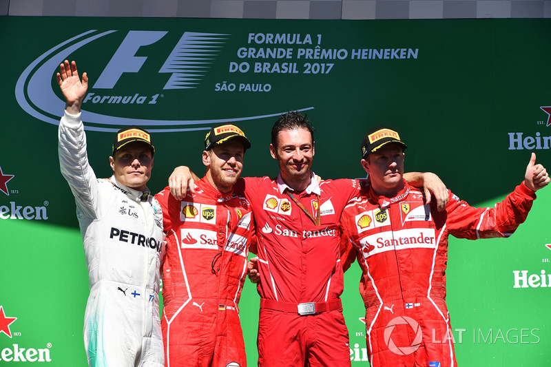 Podium: winner Sebastian Vettel, Ferrari, second place Valtteri Bottas, Mercedes AMG F1, third place Kimi Raikkonen, Ferrari