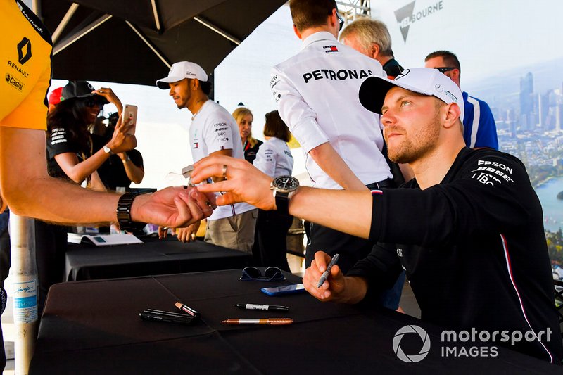 Valtteri Bottas, Mercedes AMG F1 signs a autograph for a fan