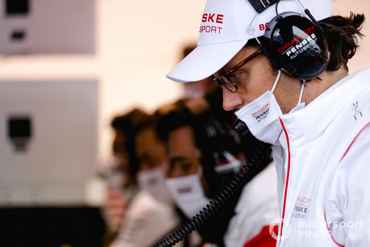 An engineer at work in the Dragon Penske garage