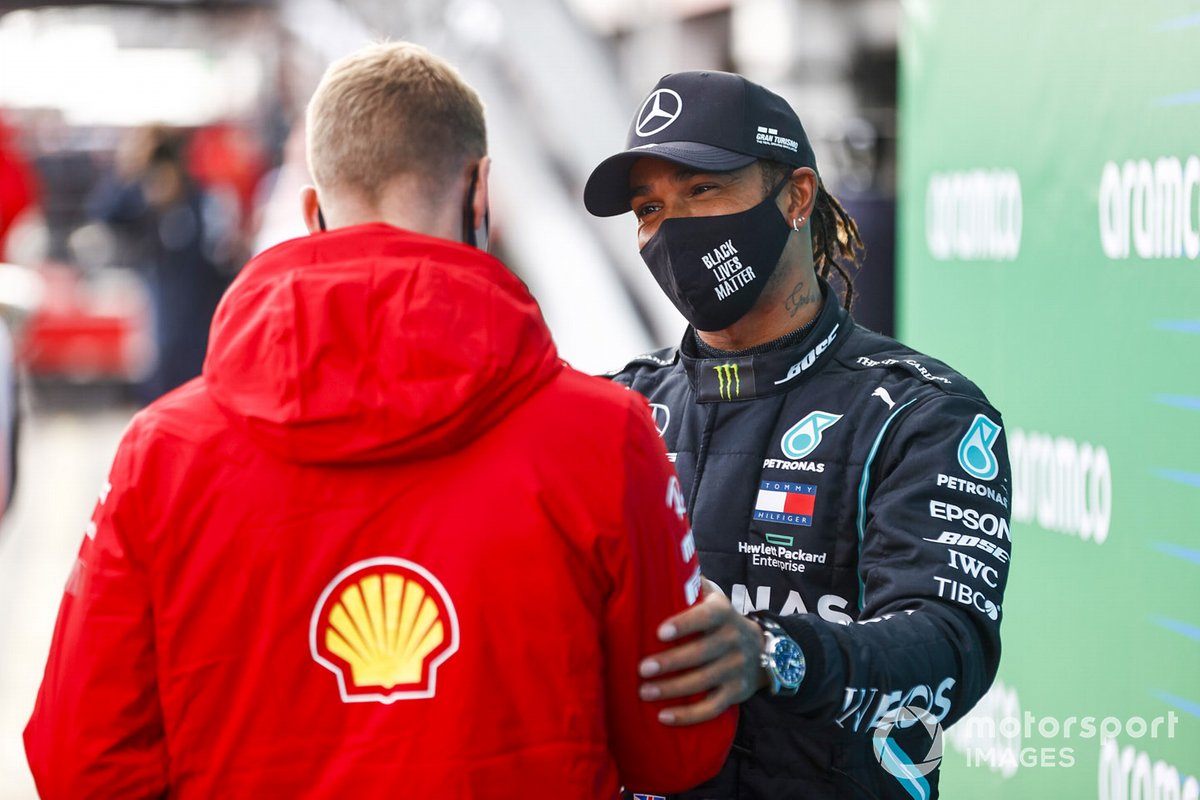 Mick Schumacher congratulates Lewis Hamilton, Mercedes-AMG F1, 1st position, on equalling his fathers race win record of 91