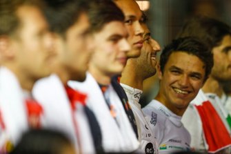 Lando Norris, McLaren, Daniel Ricciardo, Renault F1 Team, Alexander Albon, Red Bull Racing, and the other drivers lined up for the National Anthem prior to the start