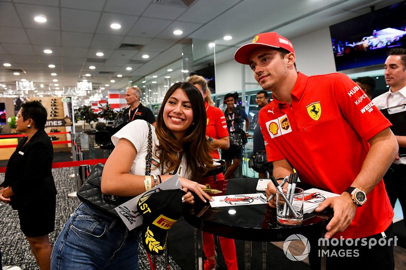 Charles Leclerc, Ferrari takes a selfie with a fan