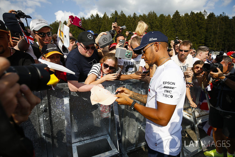 Lewis Hamilton, Mercedes AMG F1, signs autographs for fans