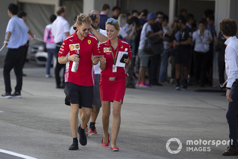 Sebastian Vettel, Ferrari con su PA, Britta Roeske