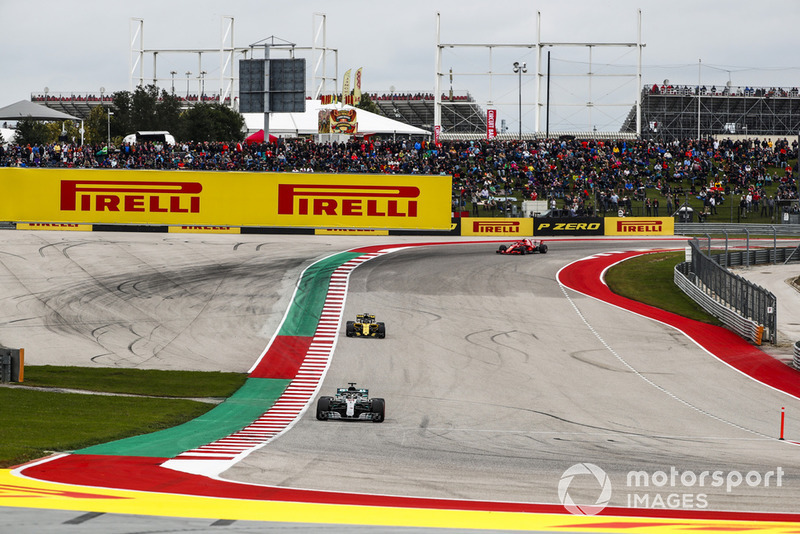 Lewis Hamilton, Mercedes AMG F1 W09 EQ Power+, leads Nico Hulkenberg, Renault Sport F1 Team R.S. 18, and Kimi Raikkonen, Ferrari SF71H