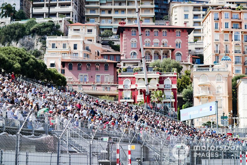 Fans in the grandstands wait for the action