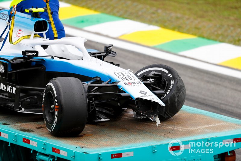 Car of Robert Kubica, Williams FW42 being recovered on a low loader