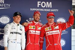 Polesitter Sebastian Vettel, Ferrari, second place Kimi Raikkonen, Ferrari, third place Valtteri Bot