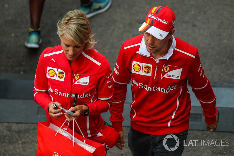 Sebastian Vettel, Ferrari, with Britta Roeske, in parc ferme