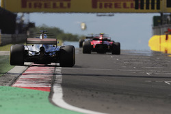 Lewis Hamilton, Mercedes AMG F1 W08, chases Kimi Raikkonen, Ferrari SF70H