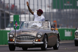 Lewis Hamilton, Mercedes AMG F1, on an Austin Healey during the drivers' parade