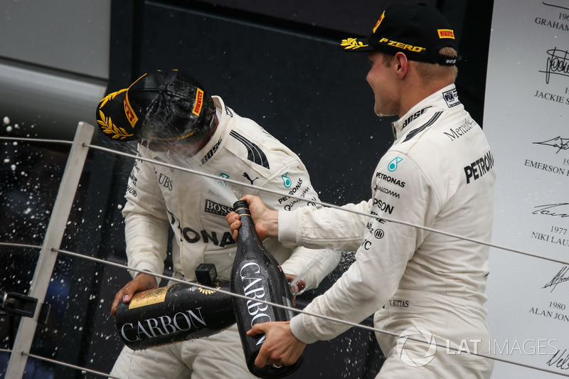 Race winner Lewis Hamilton, Mercedes AMG F1 and Valtteri Bottas, Mercedes AMG F1 celebrate on the podium