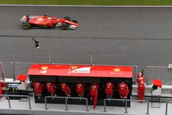 Sebastian Vettel, Ferrari SF70H passes the Ferrari pit wall gantry