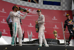 Race winner Lewis Hamilton, Mercedes AMG F1 celebrates on the podium with team mate Nico Rosberg, Mercedes AMG F1
