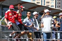 (L to R): Kimi Raikkonen, Ferrari; Sebastian Vettel, Ferrari; Pascal Wehrlein, Manor Racing; Romain Grosjean, Haas F1 Team; and Esteban Gutierrez, Haas F1 Team, on the drivers parade