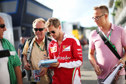 Sebastian Vettel, Ferrari signs autographs for the fans