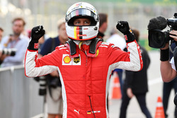 Pole sitter Sebastian Vettel, Ferrari celebrates in parc ferme