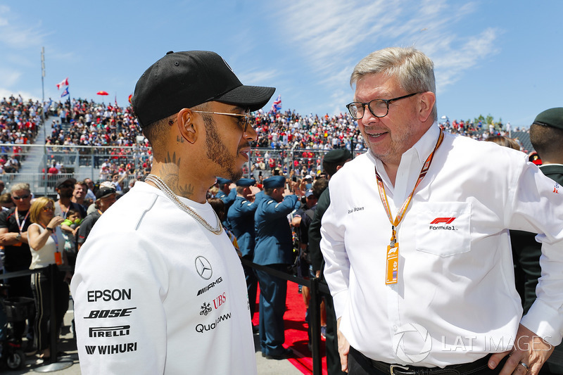 Lewis Hamilton, Mercedes AMG F1, and Ross Brawn, Managing Director of Motorsports, FOM