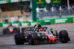 Kevin Magnussen, Haas F1 Team VF-18, leads Romain Grosjean, Haas F1 Team VF-18