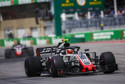Kevin Magnussen, Haas F1 Team VF-18, leads Romain Grosjean, Haas F1 Team VF-18