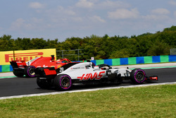 Kevin Magnussen, Haas F1 Team VF-18 and Sebastian Vettel, Ferrari SF71H