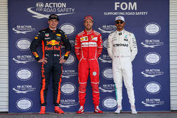 Pole winner Sebastian Vettel, Ferrari, talks to sceond place Max Verstappen, Red Bull Racing, third place Lewis Hamilton, Mercedes AMG F4