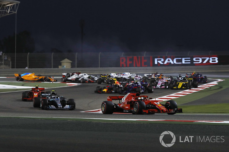 Sebastian Vettel, Ferrari SF71H leads at the start of the race